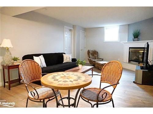 8485 Highway 93, Tiny, ON - Indoor Photo Showing Living Room With Fireplace