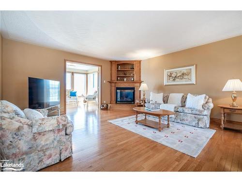 8485 Highway 93, Tiny, ON - Indoor Photo Showing Living Room With Fireplace