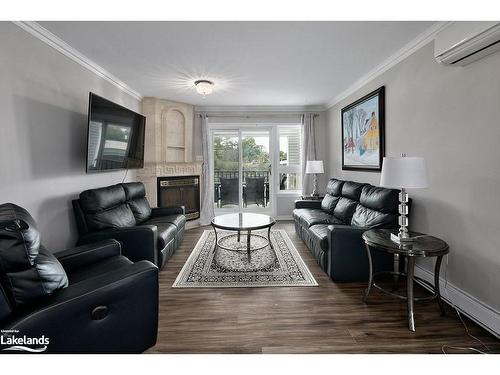 1-1 Spruce Street, Wasaga Beach, ON - Indoor Photo Showing Living Room With Fireplace