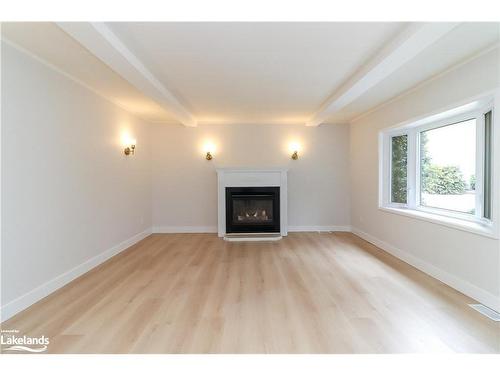 15 Hawthorne Drive, Innisfil, ON - Indoor Photo Showing Living Room With Fireplace