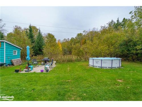 4 Stocking Lane, Huntsville, ON - Outdoor With Above Ground Pool With Backyard