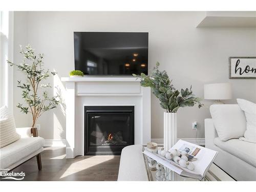 13 Autumn Drive, Wasaga Beach, ON - Indoor Photo Showing Living Room With Fireplace