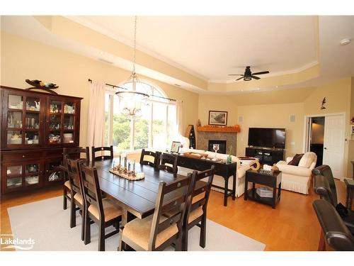 601-130 Steamship Bay Road, Gravenhurst, ON - Indoor Photo Showing Other Room With Fireplace