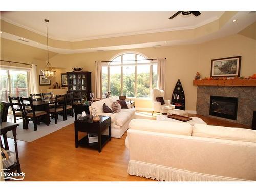 601-130 Steamship Bay Road, Gravenhurst, ON - Indoor Photo Showing Living Room With Fireplace