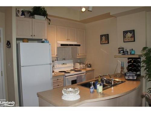 104-280 Aberdeen Boulevard, Midland, ON - Indoor Photo Showing Kitchen With Double Sink