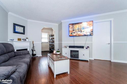 12-891 River Road W, Wasaga Beach, ON - Indoor Photo Showing Living Room With Fireplace