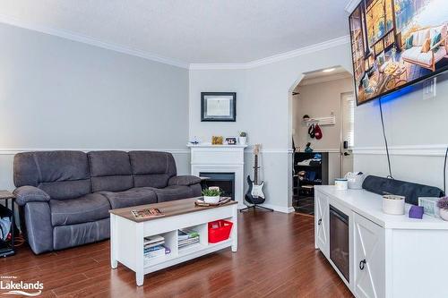 12-891 River Road W, Wasaga Beach, ON - Indoor Photo Showing Living Room With Fireplace