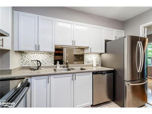 307-54 Fittons Road W, Orillia, ON - Indoor Photo Showing Kitchen With Double Sink