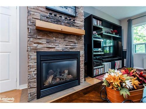 307-54 Fittons Road W, Orillia, ON - Indoor Photo Showing Living Room With Fireplace