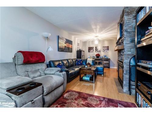 307-54 Fittons Road W, Orillia, ON - Indoor Photo Showing Living Room With Fireplace