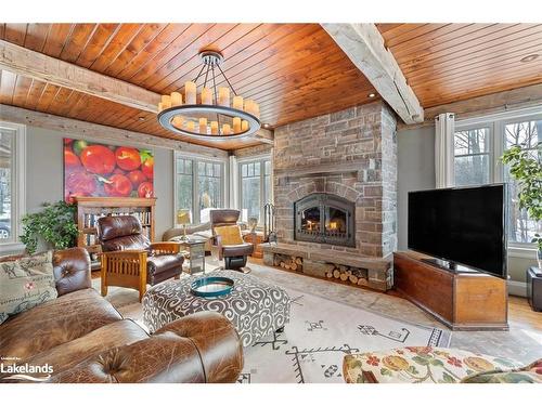 177 Osprey Heights Road, Grey Highlands, ON - Indoor Photo Showing Living Room With Fireplace