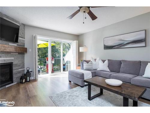 373 Mariners Way, Collingwood, ON - Indoor Photo Showing Living Room With Fireplace