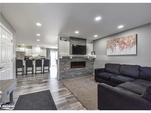 3132 Goldstein Road, Washago, ON - Indoor Photo Showing Living Room With Fireplace