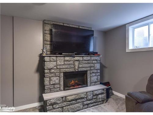 3132 Goldstein Road, Washago, ON - Indoor Photo Showing Living Room With Fireplace