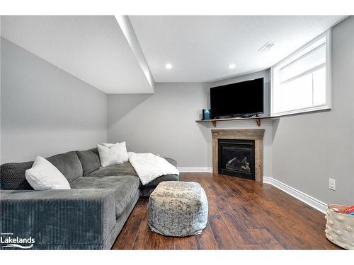 101 Garbutt Crescent, Collingwood, ON - Indoor Photo Showing Other Room With Fireplace