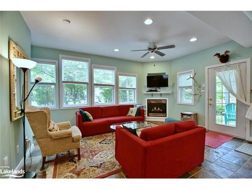 21 47Th Street N, Wasaga Beach, ON - Indoor Photo Showing Living Room With Fireplace