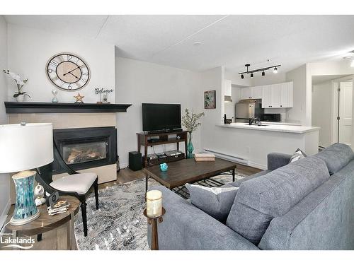 369 Mariners Way, Collingwood, ON - Indoor Photo Showing Living Room With Fireplace