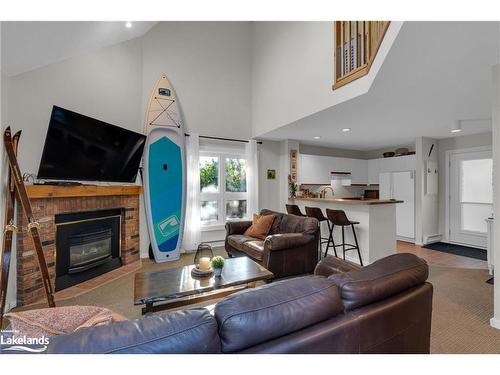 180-49 Trott Boulevard, Collingwood, ON - Indoor Photo Showing Living Room With Fireplace