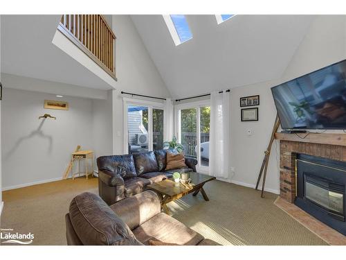 180-49 Trott Boulevard, Collingwood, ON - Indoor Photo Showing Living Room With Fireplace