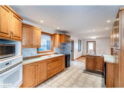 326 Lafontaine Road W, Tiny, ON - Indoor Photo Showing Kitchen With Double Sink