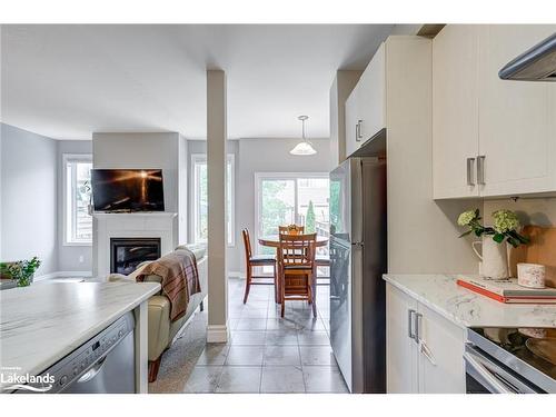 33 Lett Avenue, Collingwood, ON - Indoor Photo Showing Kitchen With Fireplace