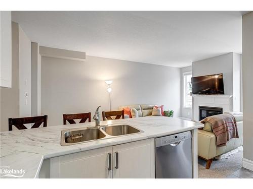 33 Lett Avenue, Collingwood, ON - Indoor Photo Showing Kitchen With Fireplace With Double Sink