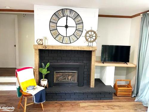 51 Grandview Road, Tay, ON - Indoor Photo Showing Living Room With Fireplace