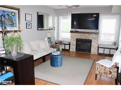 107-3 Brandy Lane Drive, Collingwood, ON - Indoor Photo Showing Living Room With Fireplace