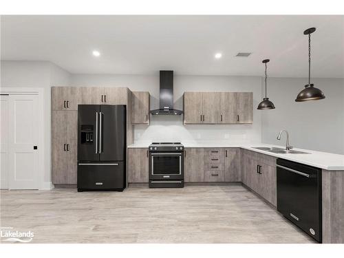 205-20 Salt Dock Road, Parry Sound, ON - Indoor Photo Showing Kitchen With Double Sink