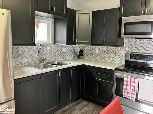 A-218 Fifth Street, Collingwood, ON - Indoor Photo Showing Kitchen With Double Sink