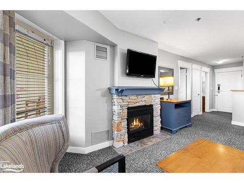 223-170 Jozo Weider Boulevard, The Blue Mountains, ON - Indoor Photo Showing Living Room With Fireplace