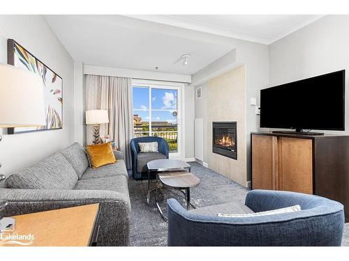 376-220 Gord Canning Drive, The Blue Mountains, ON - Indoor Photo Showing Living Room With Fireplace