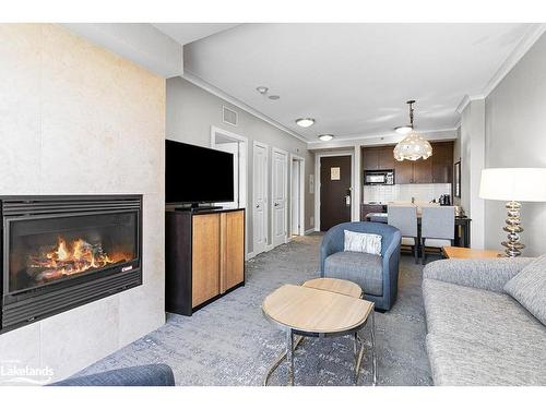 376-220 Gord Canning Drive, The Blue Mountains, ON - Indoor Photo Showing Living Room With Fireplace