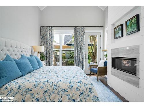 97 Beech Street, Collingwood, ON - Indoor Photo Showing Bedroom With Fireplace