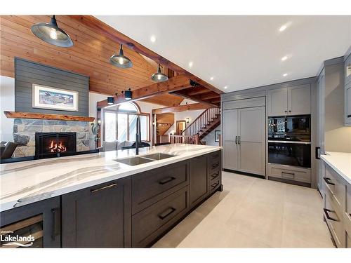 164 Wensley Drive, Clarksburg, ON - Indoor Photo Showing Kitchen With Fireplace With Double Sink