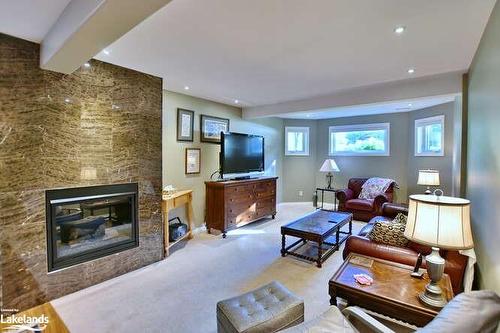 4 Pauline Place, Wasaga Beach, ON - Indoor Photo Showing Living Room With Fireplace