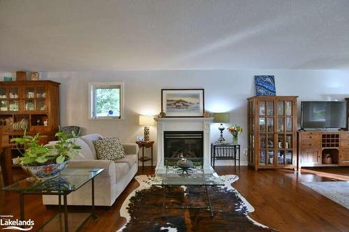 4 Pauline Place, Wasaga Beach, ON - Indoor Photo Showing Living Room With Fireplace