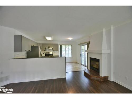 2A Silver Birch Avenue, Wasaga Beach, ON - Indoor Photo Showing Living Room With Fireplace