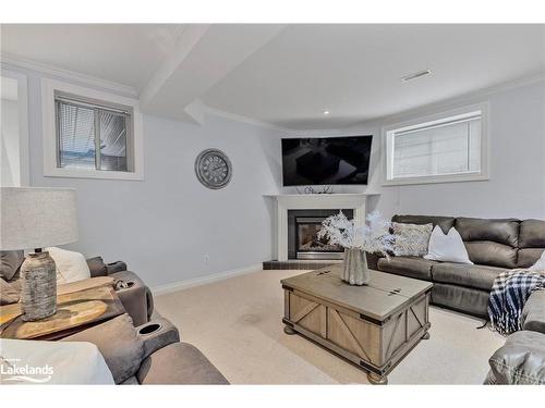 4 Foxwood Crescent, Wasaga Beach, ON - Indoor Photo Showing Living Room With Fireplace