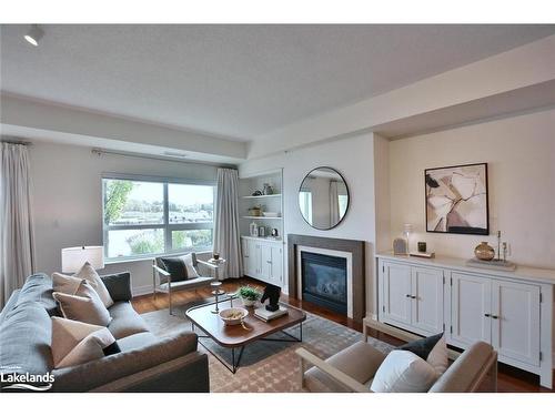 107-1 Shipyard Lane, Collingwood, ON - Indoor Photo Showing Living Room With Fireplace