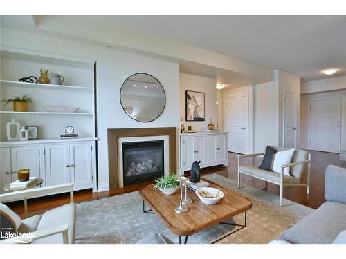 107-1 Shipyard Lane, Collingwood, ON - Indoor Photo Showing Living Room With Fireplace