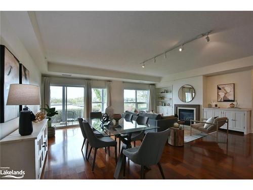 107-1 Shipyard Lane, Collingwood, ON - Indoor Photo Showing Dining Room With Fireplace