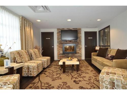 107-1 Shipyard Lane, Collingwood, ON - Indoor Photo Showing Living Room With Fireplace