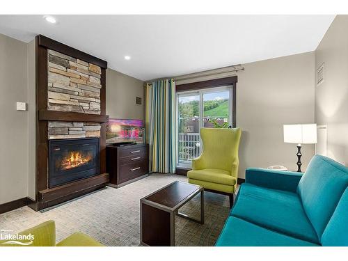 244-190 Jozo Weider Boulevard, The Blue Mountains, ON - Indoor Photo Showing Living Room With Fireplace