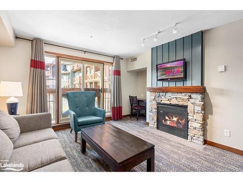 226-152 Jozo Weider Boulevard, The Blue Mountains, ON - Indoor Photo Showing Living Room With Fireplace