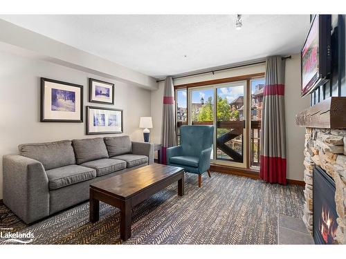 226-152 Jozo Weider Boulevard, The Blue Mountains, ON - Indoor Photo Showing Living Room With Fireplace