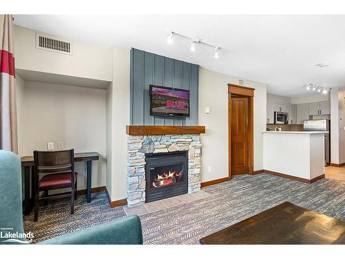 226-152 Jozo Weider Boulevard, The Blue Mountains, ON - Indoor Photo Showing Living Room With Fireplace