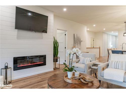 55 Jack Street, Huntsville, ON - Indoor Photo Showing Living Room With Fireplace