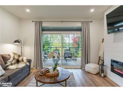 55 Jack Street, Huntsville, ON - Indoor Photo Showing Living Room With Fireplace