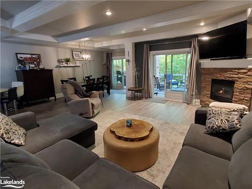 174 Vacation Inn Drive, Collingwood, ON - Indoor Photo Showing Living Room With Fireplace